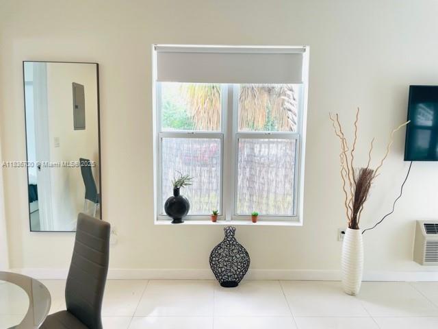 1419 W Ave Unit 106, Miami Beach, FL 33139 - dining room with tile patterned floors
