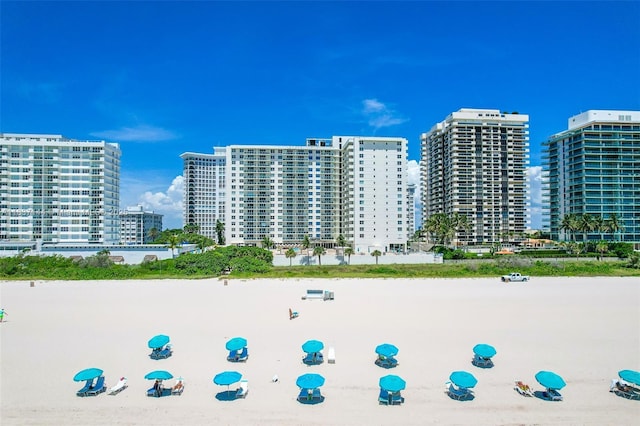 5701 Collins Ave Unit 1611, Miami Beach, FL 33140 - view of building exterior with a city view and a water view