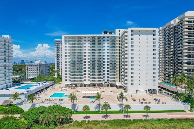 5701 Collins Ave Unit 1611, Miami Beach, FL 33140 - view of property featuring a view of city and a community pool
