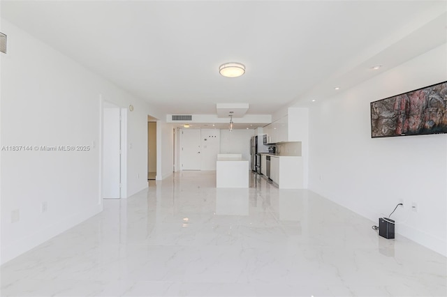 5701 Collins Ave Unit 1611, Miami Beach, FL 33140 - unfurnished living room with light marble finish flooring