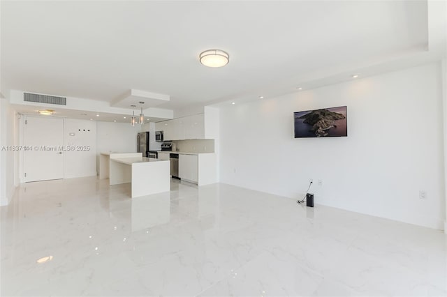 5701 Collins Ave Unit 1611, Miami Beach, FL 33140 - unfurnished living room featuring light marble finish flooring and recessed lighting