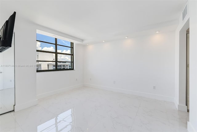 5701 Collins Ave Unit 1611, Miami Beach, FL 33140 - spare room featuring recessed lighting and marble finish flooring