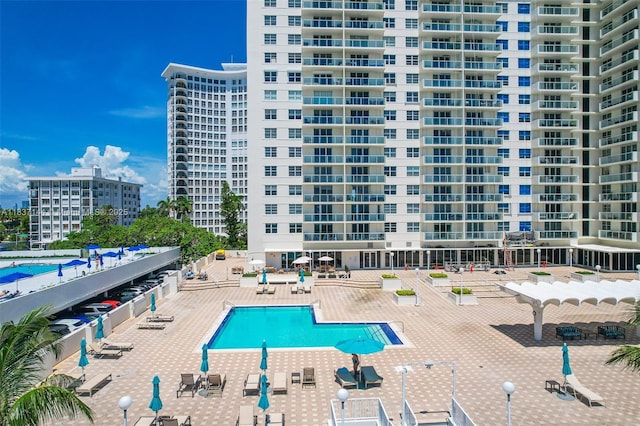 5701 Collins Ave Unit 1611, Miami Beach, FL 33140 - community pool featuring a patio area