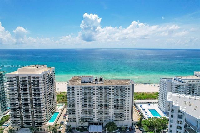 5701 Collins Ave Unit 1611, Miami Beach, FL 33140 - drone / aerial view of a pool area and a nearby body of water
