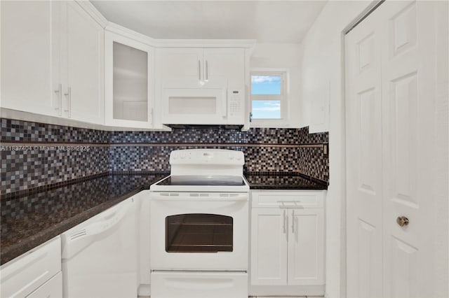 1990 W 56th St Unit 1407, Hialeah, FL 33012 - kitchen with white appliances, white cabinetry, and dark countertops