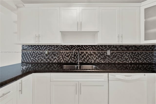 1990 W 56th St Unit 1407, Hialeah, FL 33012 - kitchen with white dishwasher, white cabinets, and backsplash