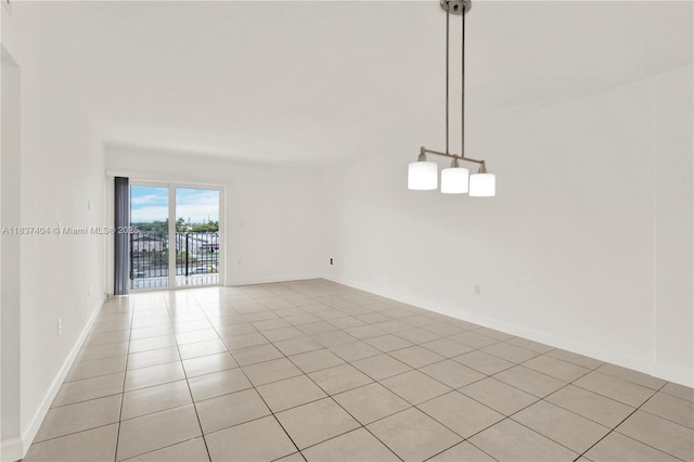 1990 W 56th St Unit 1407, Hialeah, FL 33012 - unfurnished room with light tile patterned floors and baseboards