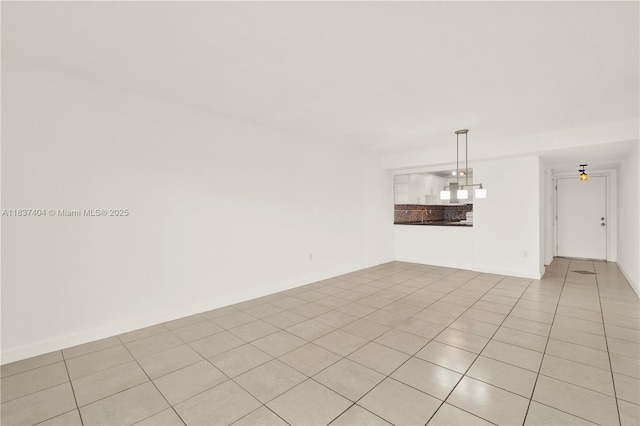 1990 W 56th St Unit 1407, Hialeah, FL 33012 - spare room featuring light tile patterned floors
