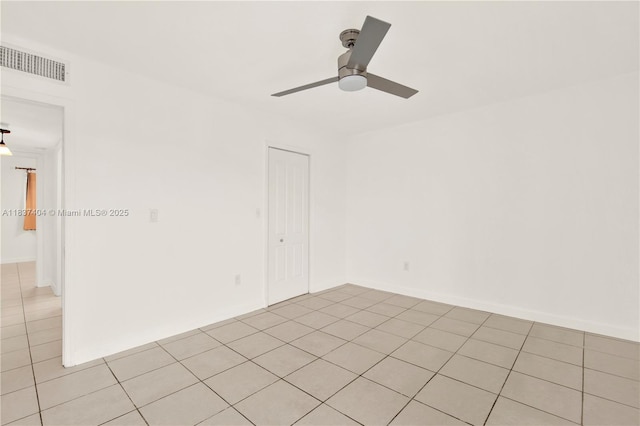 1990 W 56th St Unit 1407, Hialeah, FL 33012 - empty room with light tile patterned flooring and ceiling fan