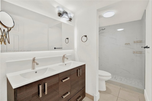 1990 W 56th St Unit 1407, Hialeah, FL 33012 - bathroom featuring double vanity, a marble finish shower, and tile patterned floors