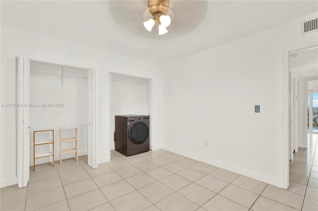 1990 W 56th St Unit 1407, Hialeah, FL 33012 - unfurnished bedroom featuring washer / clothes dryer, light tile patterned floors, and a ceiling fan