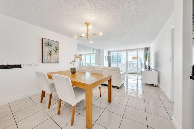 1717 N Bayshore Dr Unit A-3237, Miami, FL 33132 - dining area with a chandelier, a textured ceiling, and light tile patterned floors