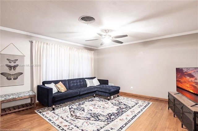 2600 Lakeview Dr, Sebring, FL 33870 - living room with light wood finished floors, ceiling fan, and crown molding