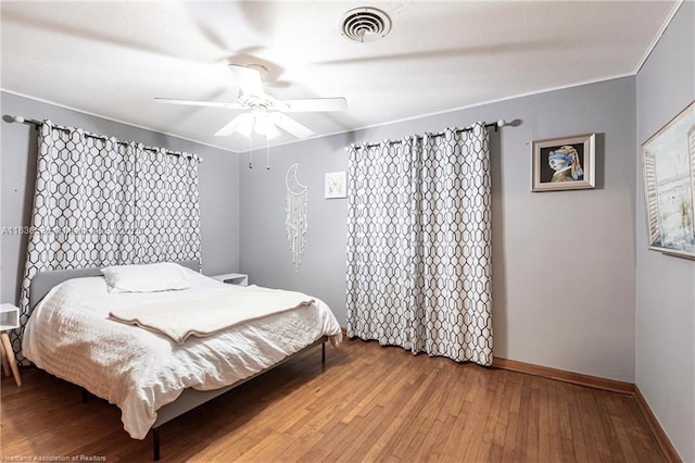 2600 Lakeview Dr, Sebring, FL 33870 - bedroom with hardwood / wood-style floors and ceiling fan