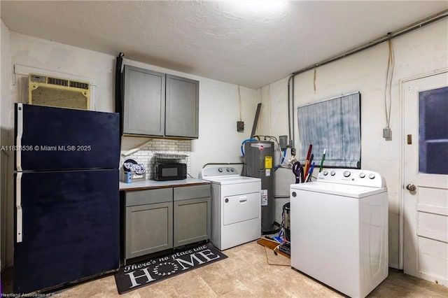 2600 Lakeview Dr, Sebring, FL 33870 - washroom featuring electric water heater, cabinet space, washer and dryer, a wall mounted air conditioner, and light flooring