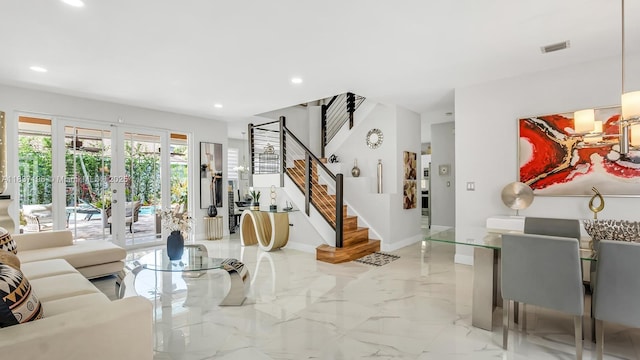 16204 SW 18th Pl, Miramar, FL 33027 - living room featuring recessed lighting, stairway, light marble finish flooring, and french doors