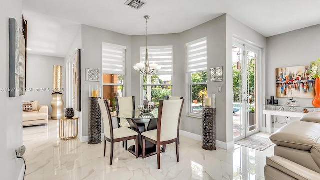 16204 SW 18th Pl, Miramar, FL 33027 - dining room with marble tiled floors and a chandelier