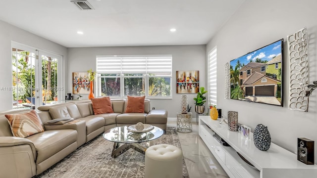 16204 SW 18th Pl, Miramar, FL 33027 - living room with marble tiled floors, healthy amount of natural light, and recessed lighting