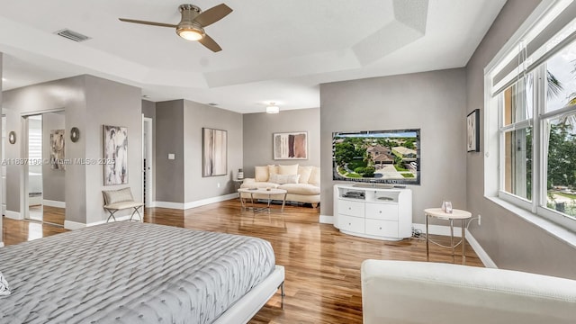 16204 SW 18th Pl, Miramar, FL 33027 - bedroom with a raised ceiling, wood finished floors, and ceiling fan