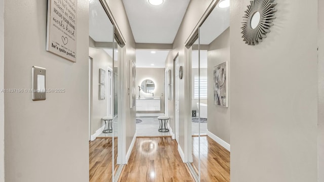 16204 SW 18th Pl, Miramar, FL 33027 - corridor featuring wood finished floors and baseboards