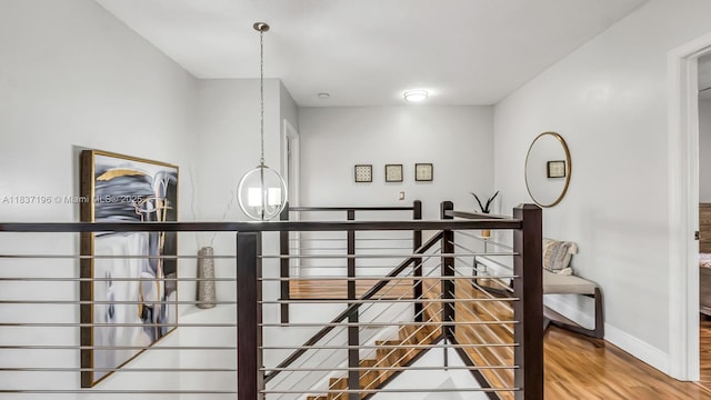 16204 SW 18th Pl, Miramar, FL 33027 - hallway featuring wood finished floors and an upstairs landing