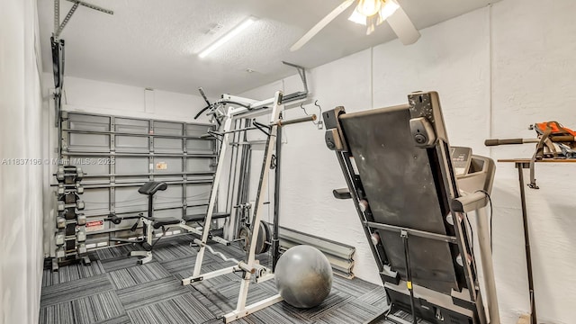 16204 SW 18th Pl, Miramar, FL 33027 - exercise room with a textured wall, a ceiling fan, a textured ceiling, and carpet flooring