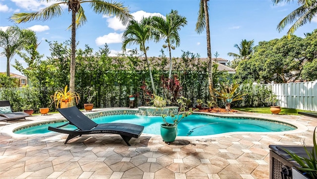 16204 SW 18th Pl, Miramar, FL 33027 - view of swimming pool with a fenced backyard and a patio