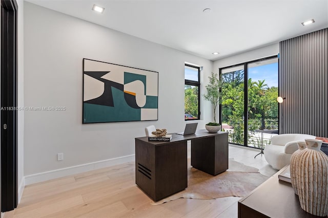416 NW 24th St, Wilton Manors, FL 33311 - office area with light wood-style floors and recessed lighting