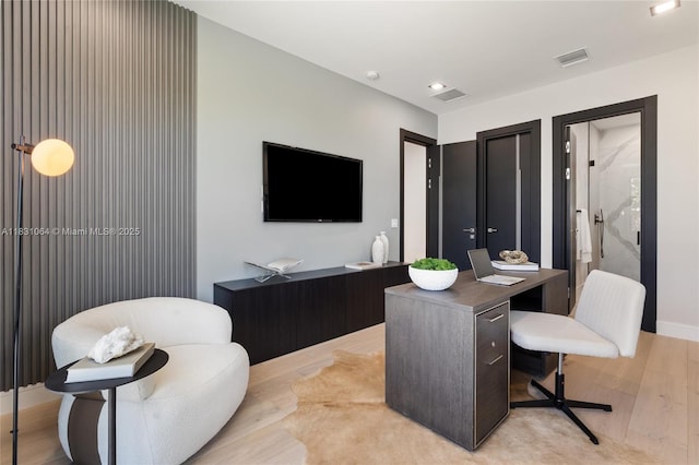 416 NW 24th St, Wilton Manors, FL 33311 - office area featuring light wood-style floors and baseboards