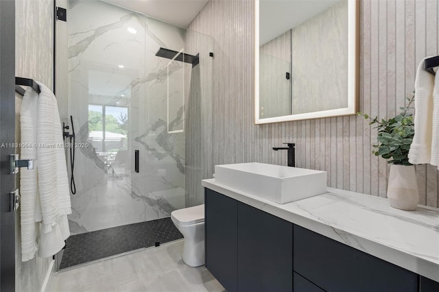 416 NW 24th St, Wilton Manors, FL 33311 - bathroom featuring a marble finish shower and vanity