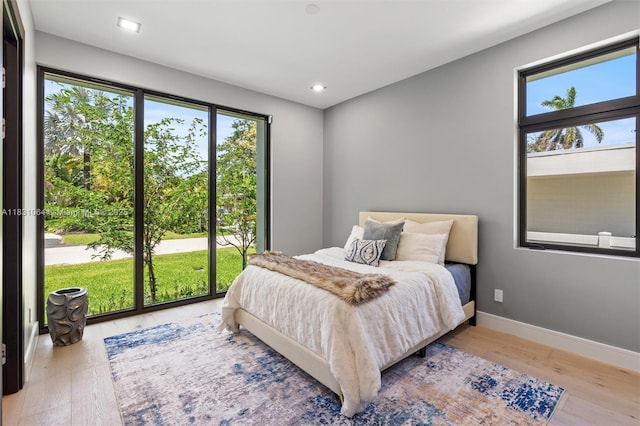 416 NW 24th St, Wilton Manors, FL 33311 - bedroom featuring wood finished floors and recessed lighting