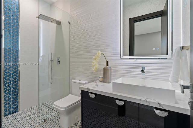 416 NW 24th St, Wilton Manors, FL 33311 - bathroom featuring tile walls, walk in shower, vanity, and tile patterned floors