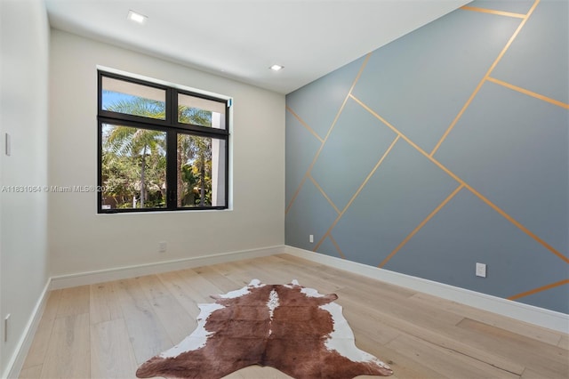 416 NW 24th St, Wilton Manors, FL 33311 - empty room featuring wood-type flooring and recessed lighting