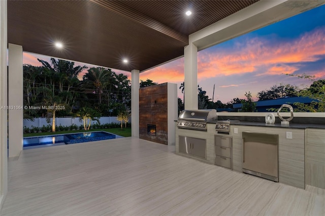 416 NW 24th St, Wilton Manors, FL 33311 - view of patio / terrace with exterior kitchen