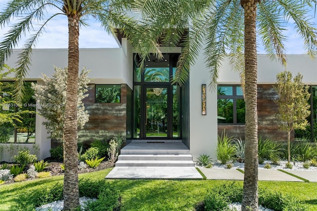416 NW 24th St, Wilton Manors, FL 33311 - entrance to property featuring stucco siding