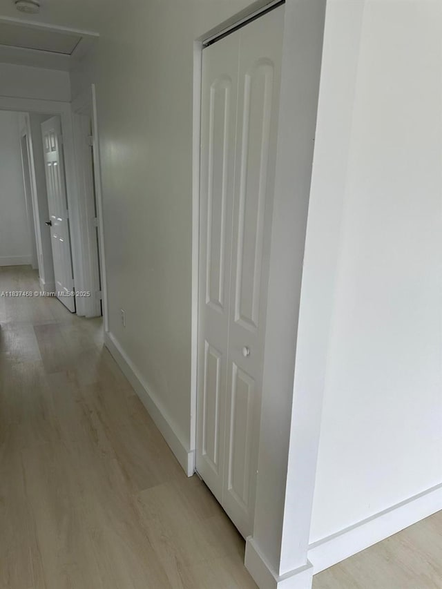 420 Burning Tree Ln, Punta Gorda, FL 33982 - corridor with light wood finished floors and baseboards