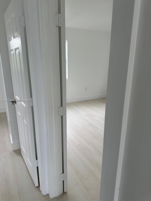 420 Burning Tree Ln, Punta Gorda, FL 33982 - hall with light wood-style floors and baseboards