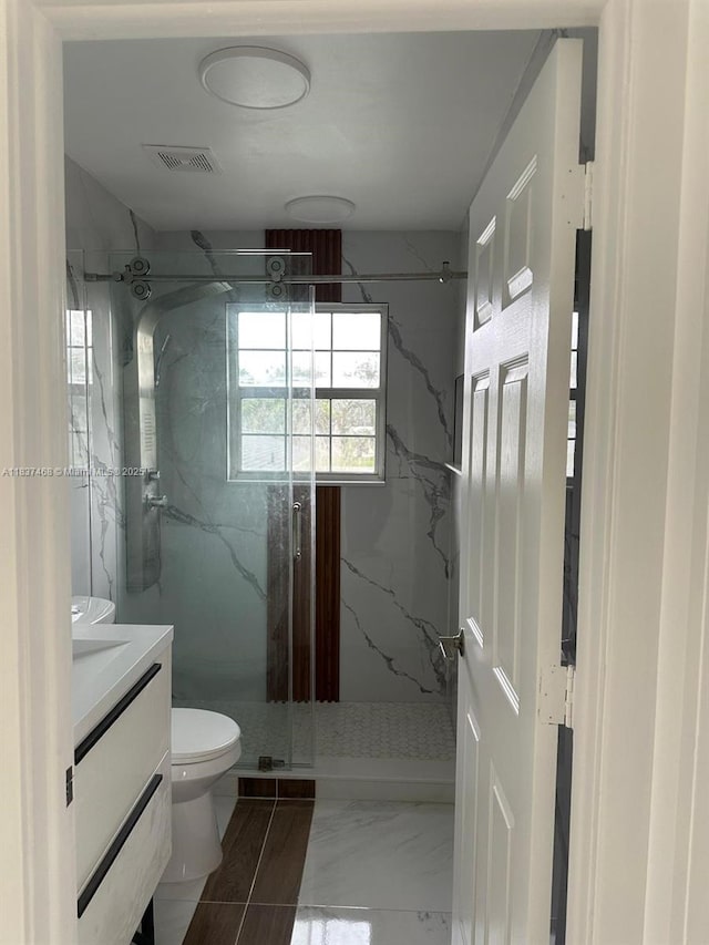 420 Burning Tree Ln, Punta Gorda, FL 33982 - full bathroom with a marble finish shower, vanity, and marble finish floors