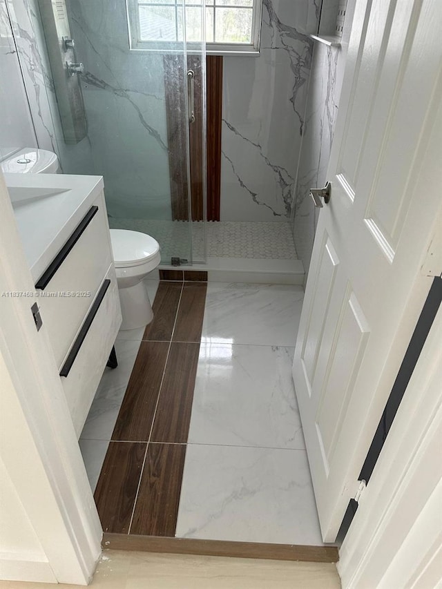 420 Burning Tree Ln, Punta Gorda, FL 33982 - full bath featuring a marble finish shower, vanity, and marble finish floors