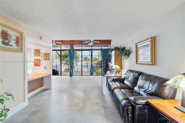 1512 NW 113th Way, Pembroke Pines, FL 33026 - living room with a textured ceiling and a ceiling fan