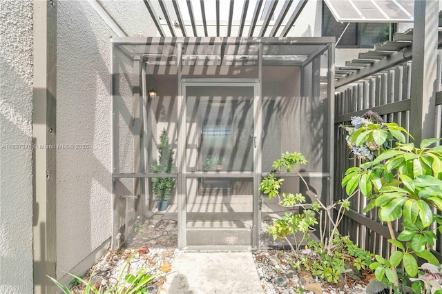 1512 NW 113th Way, Pembroke Pines, FL 33026 - doorway to property featuring a pergola