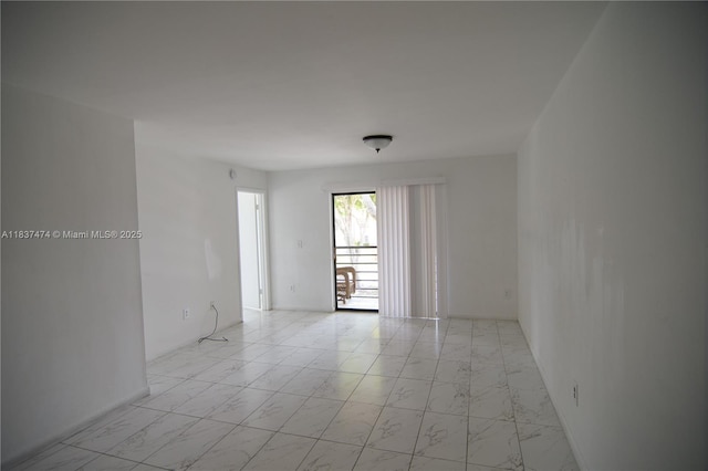 20825 NE 8th Ct Unit 203-19, Miami, FL 33179 - spare room with light marble finish floors