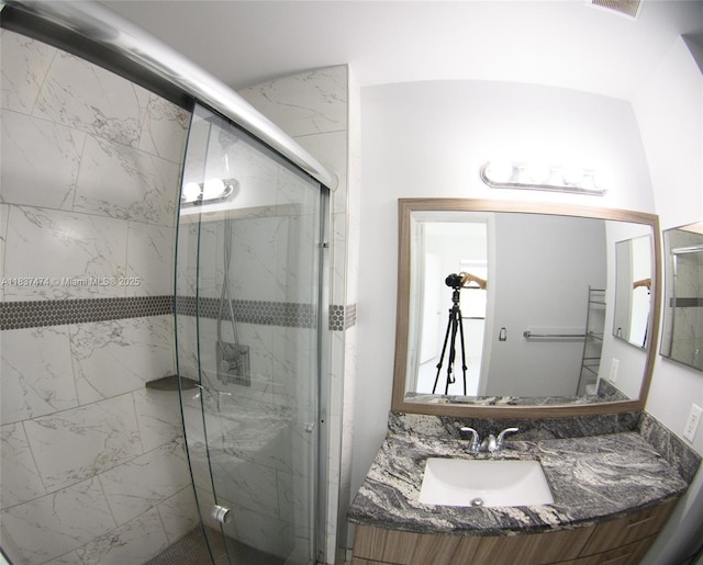 20825 NE 8th Ct Unit 203-19, Miami, FL 33179 - bathroom featuring a marble finish shower and vanity