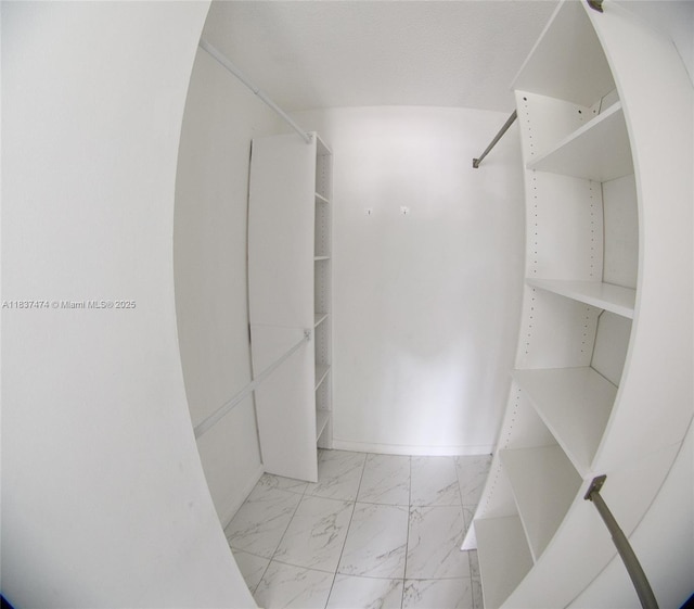 20825 NE 8th Ct Unit 203-19, Miami, FL 33179 - spacious closet featuring marble finish floors