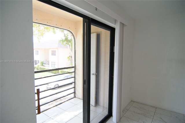 20825 NE 8th Ct Unit 203-19, Miami, FL 33179 - entryway with light marble finish flooring