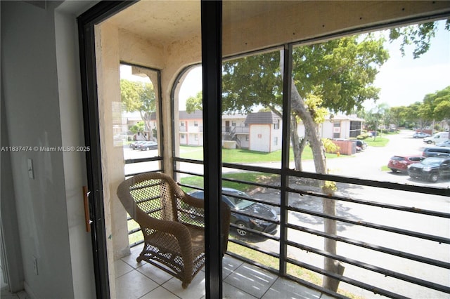 20825 NE 8th Ct Unit 203-19, Miami, FL 33179 - sunroom / solarium featuring plenty of natural light and a residential view