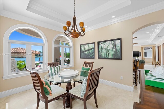 66 S Hibiscus Dr, Miami Beach, FL 33139 - dining space with inlaid floor details, crown molding, a chandelier, and coffered ceiling