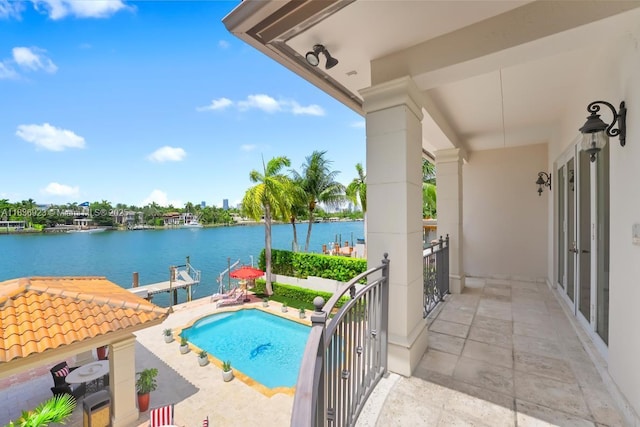 66 S Hibiscus Dr, Miami Beach, FL 33139 - bathroom featuring healthy amount of natural light, a bath, a stall shower, a water view, and recessed lighting
