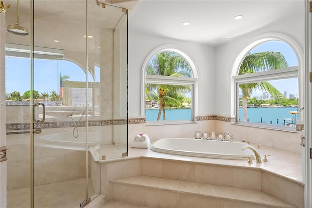 66 S Hibiscus Dr, Miami Beach, FL 33139 - bathroom with crown molding, double vanity, a stall shower, and recessed lighting
