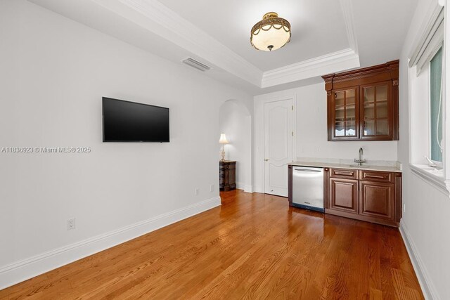 66 S Hibiscus Dr, Miami Beach, FL 33139 - walk in closet featuring wood finished floors